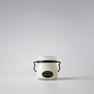 5 oz small white jar with a black lid and 'Berries & Cream' label on a white background