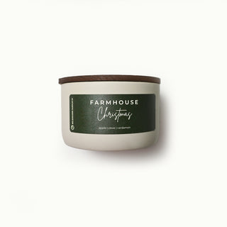 10 oz statement candle with a label reading 'Farmhouse Christmas' on a white background