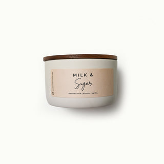 10 oz statement candle with 'Milk & Sugar' label on a white background
