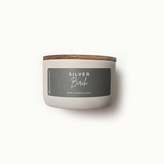 10 oz statement candle with a wooden lid and 'Silver Birch' label on a white background