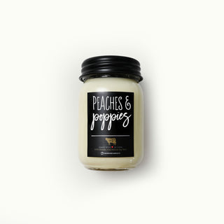 13 oz 'Peaches & Poppies' mason jar candle with black lid and label on a white background