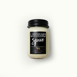 13 oz 'Winterberry Spice' mason jar candle with black lid and label on a white background