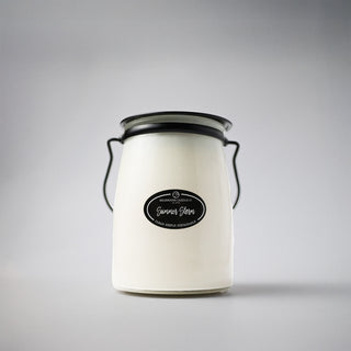 22 oz white glass jar with black lid and 'Summer Storm' label on a white background