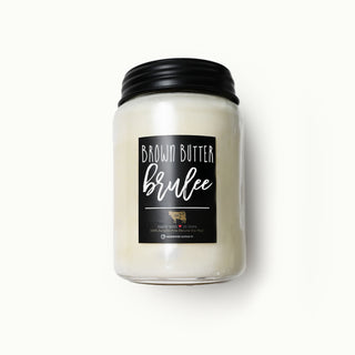 Candle jar labeled 'Brown Butter Brulee' on a white background