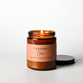 The Classic Collection candle in an amber jar with a 'Caramel Corn' label on a white background