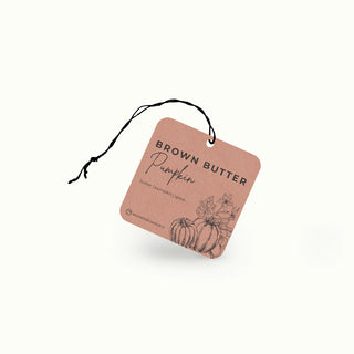Brown Butter Pumpkin air freshener tag on a white background