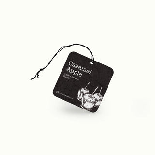Car air freshener with 'Caramel Apple' scent on a white background