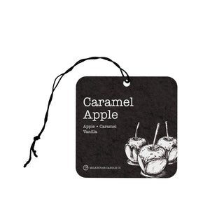 Caramel apple-themed car air freshener with black and white design on a white background