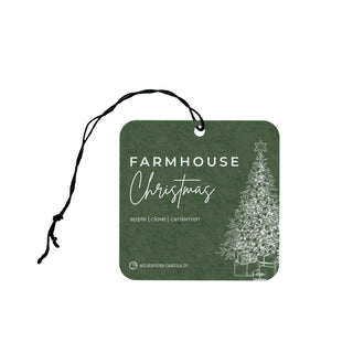 Green air freshener tag with Christmas tree design and text on a white background
