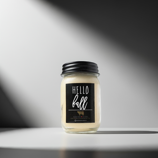 Jar candle with 'Hello Fall' label on a white background