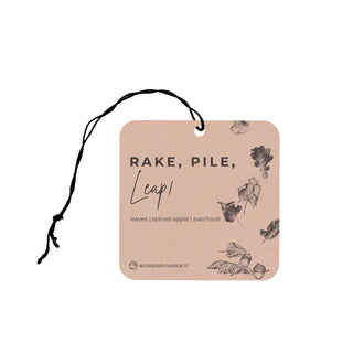Car air freshener with text and leaf illustrations on a white background