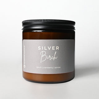 Candle jar labeled 'Silver Birch' on a white background