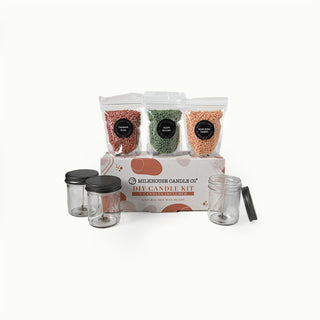 DIY candle kit with jars and colored wax beads on a white background