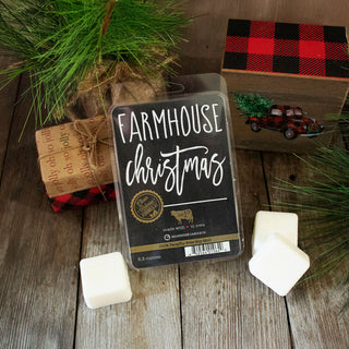 Farmhouse Christmas wax melt package on a wooden surface with decorative elements