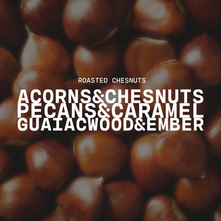 Roasted Chestnuts with a text overlay on a chestnut background with a product description of acorns & chestnuts, pecans & caramel and guaiac wood & ember
